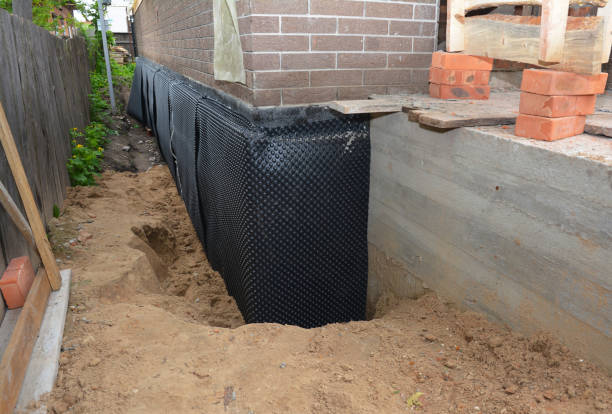 Happy homeowners after waterproofing job in Sumerduck